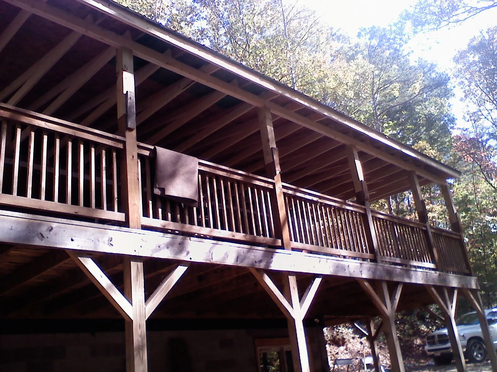 Timber framing under a new elevated porch and deck — Roof Leak Repair in Hightstown by Roofing Brothers